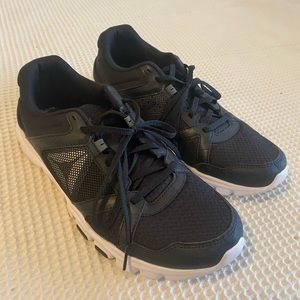 Lightly used Reebok running shoes size 11